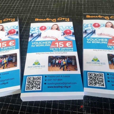 Turistični kuponi s fotografijami in QR-kodo